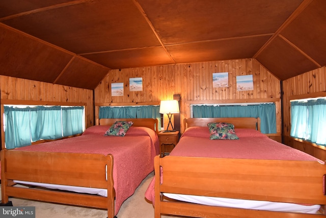 carpeted bedroom with lofted ceiling, wooden walls, and wooden ceiling