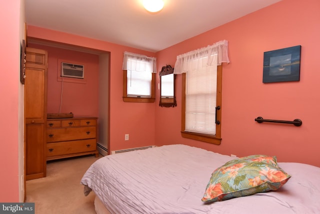 bedroom featuring a baseboard radiator, light carpet, baseboard heating, and a wall mounted AC