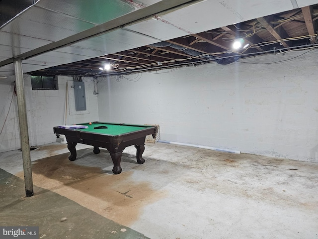 playroom with electric panel, pool table, and concrete flooring