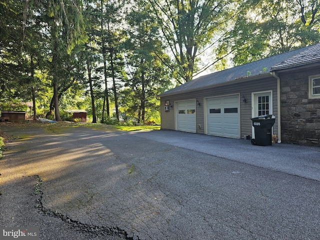 garage with driveway