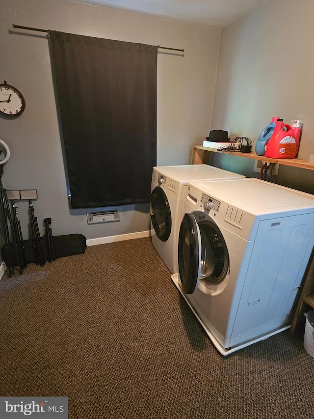 laundry room featuring laundry area, carpet, and washer and dryer