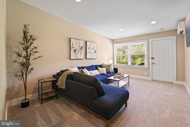 carpeted living room featuring an AC wall unit