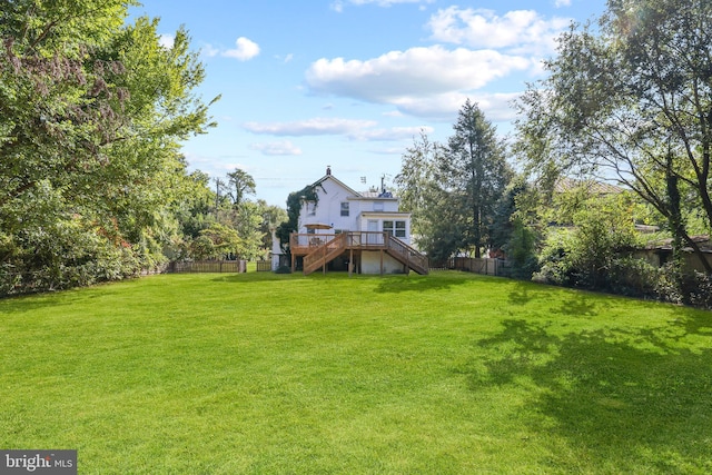 view of yard featuring a deck