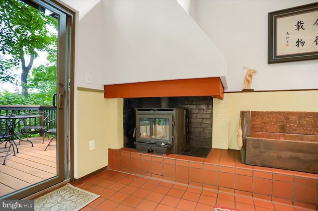 tiled living room with a fireplace