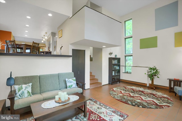 living room featuring a high ceiling