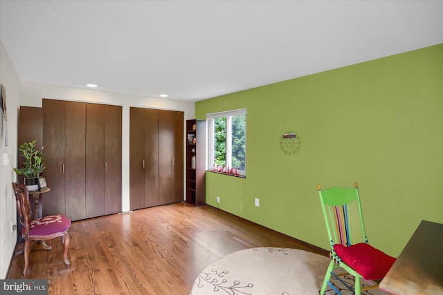 unfurnished room featuring wood-type flooring