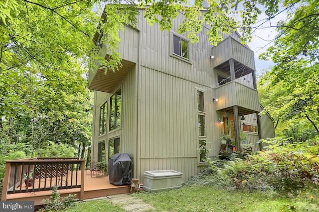 view of home's exterior featuring a deck