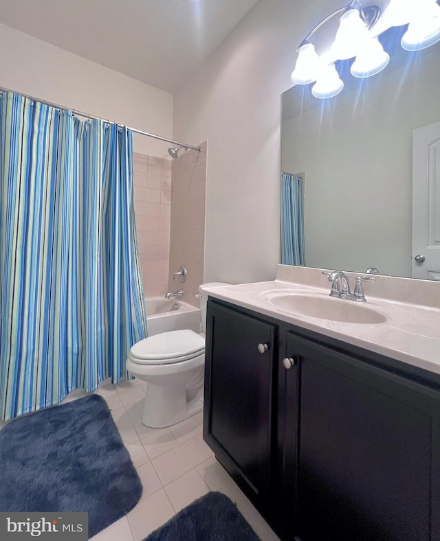 full bathroom with shower / bath combo, tile patterned flooring, vanity, and toilet