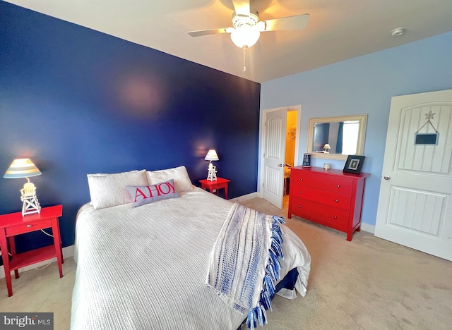 bedroom with ceiling fan and carpet