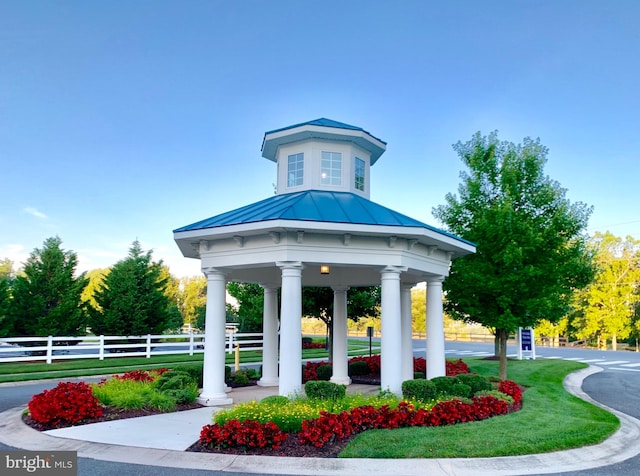 view of home's community with a lawn