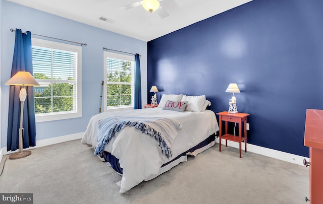 carpeted bedroom featuring ceiling fan