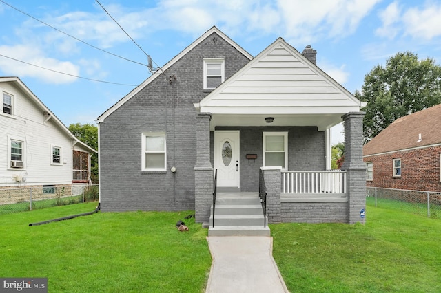 bungalow with a front yard