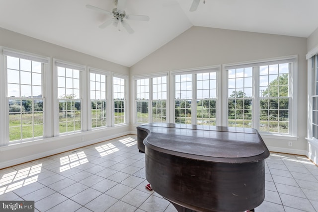 sunroom with lofted ceiling, plenty of natural light, and ceiling fan