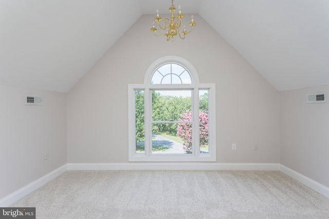 bonus room featuring light colored carpet, an inviting chandelier, and vaulted ceiling