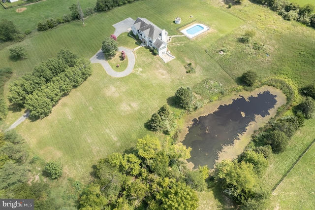 aerial view with a water view and a rural view