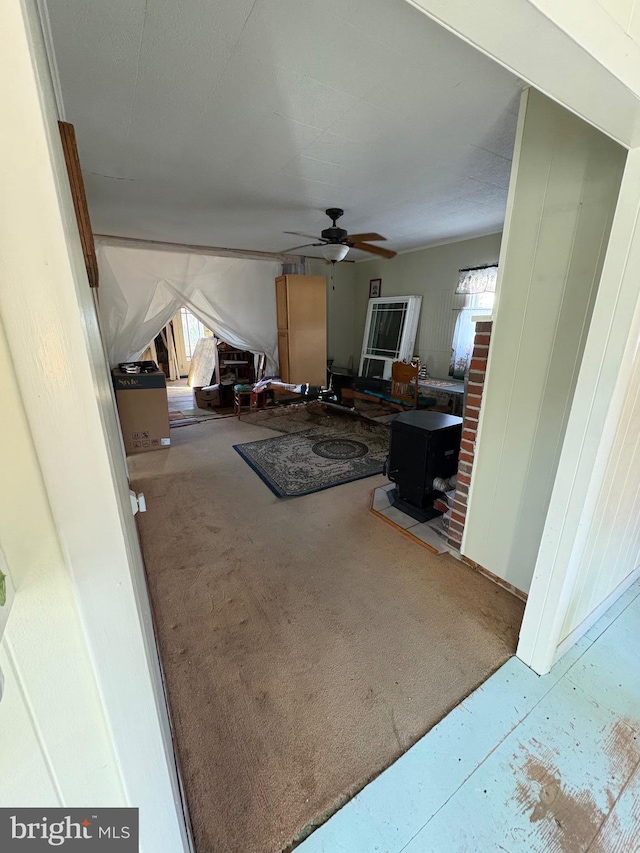 interior space with a healthy amount of sunlight and ceiling fan