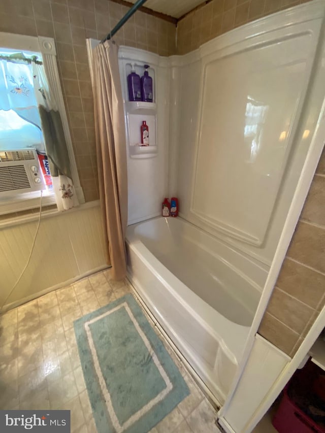 full bathroom with shower / bath combination with curtain