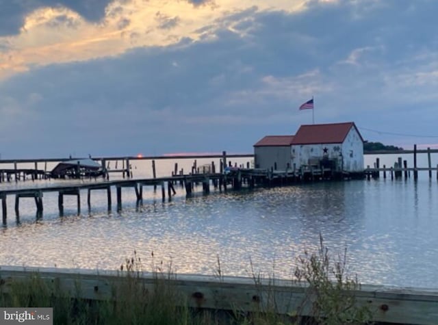 view of dock with a water view