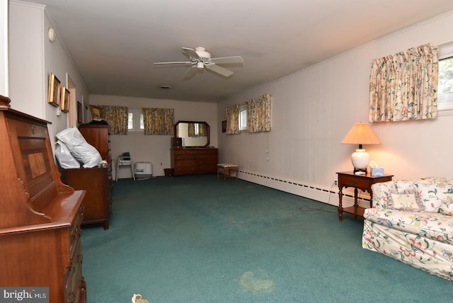 living area with ceiling fan, carpet floors, baseboard heating, and a healthy amount of sunlight