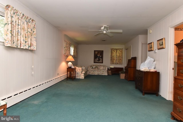 living area featuring a baseboard heating unit, dark colored carpet, and ceiling fan