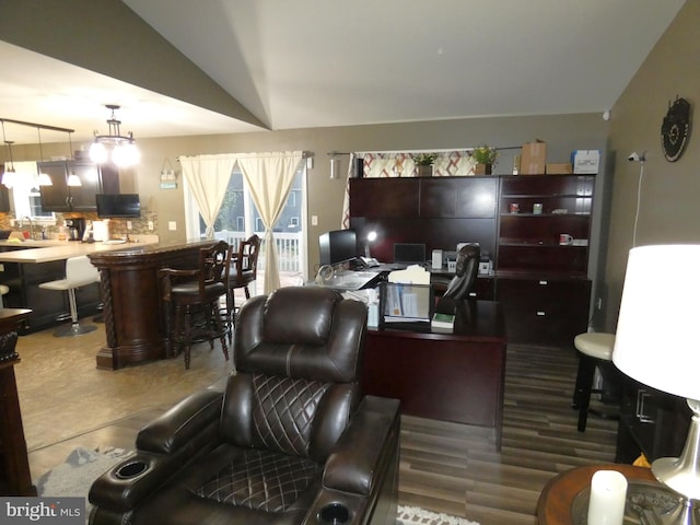 living room featuring vaulted ceiling, sink, and dark hardwood / wood-style floors