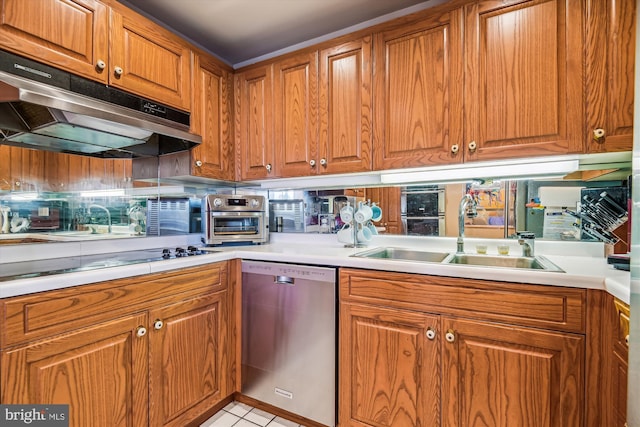 kitchen with brown cabinets, black electric cooktop, stainless steel dishwasher, under cabinet range hood, and a sink