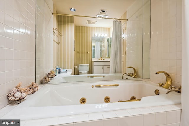 full bath featuring toilet, visible vents, vanity, and tile walls