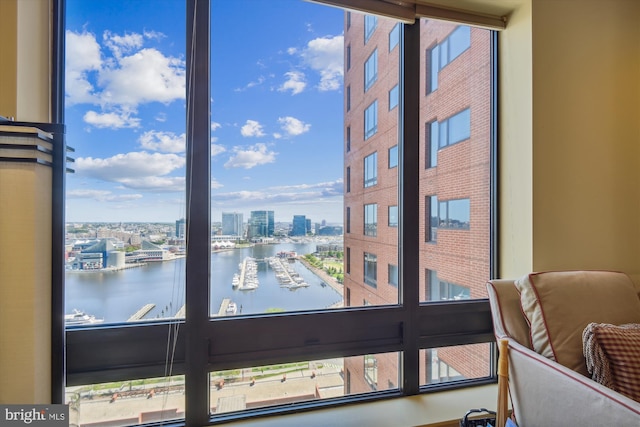 interior space with a view of city and a water view