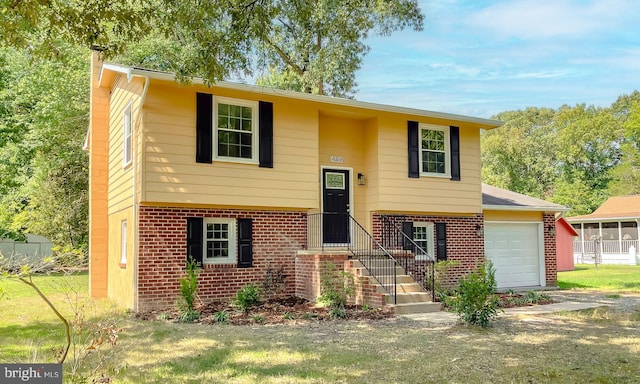 split foyer home featuring a garage