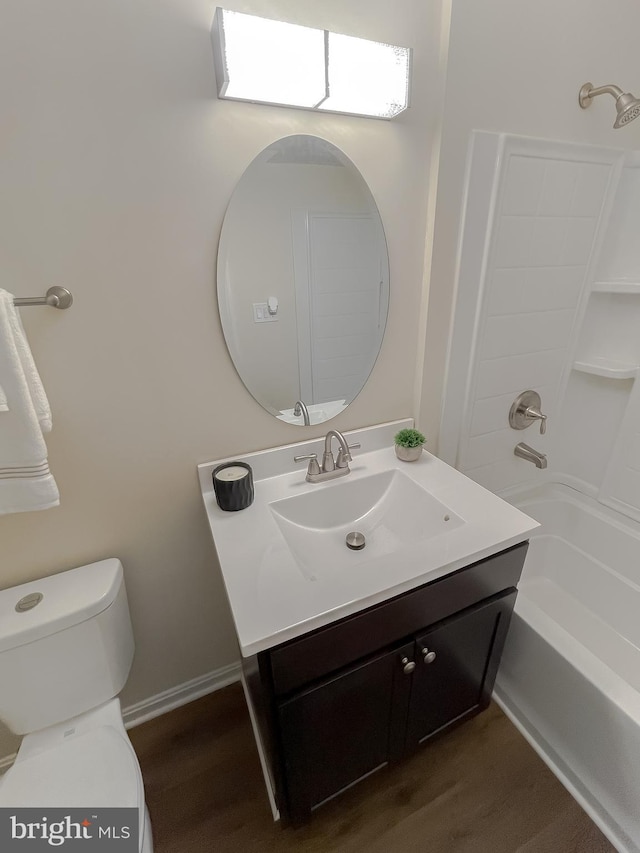 full bathroom with vanity, toilet, shower / tub combination, and wood-type flooring