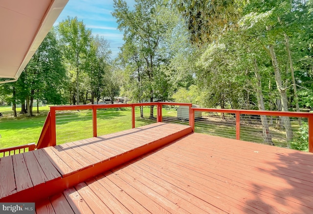 wooden deck with a lawn