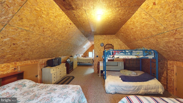 unfurnished bedroom featuring lofted ceiling