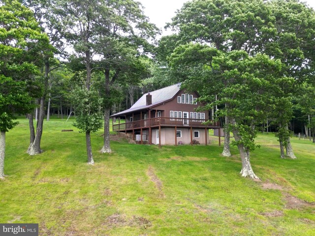 view of yard featuring a deck