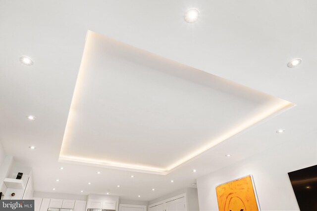 detailed view of a raised ceiling and recessed lighting