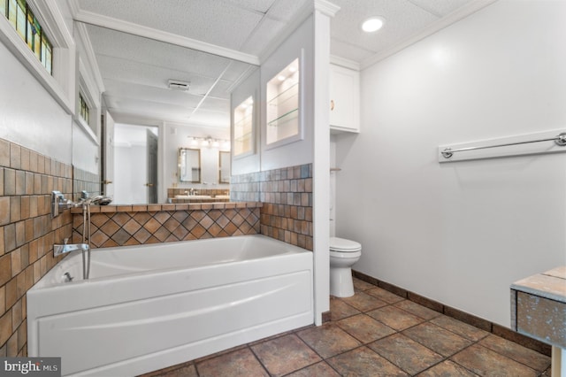 bathroom with a bathing tub and toilet