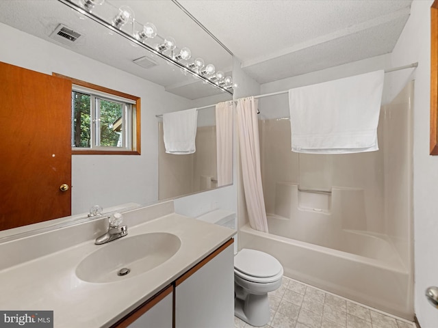 full bathroom featuring shower / bath combination with curtain, toilet, a textured ceiling, and vanity