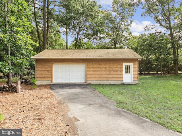 garage with a lawn