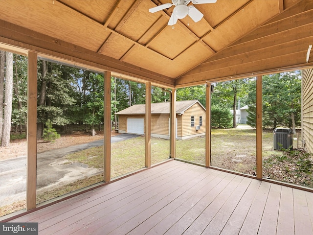 unfurnished sunroom featuring vaulted ceiling, ceiling fan, and wood ceiling