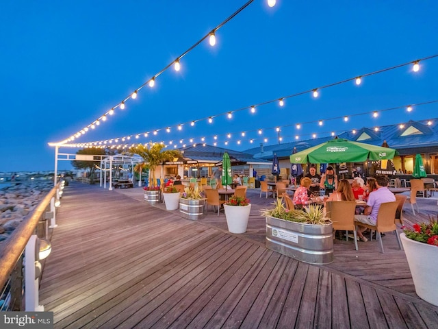 view of deck at twilight