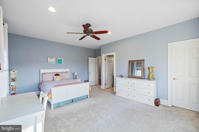 carpeted bedroom featuring ceiling fan