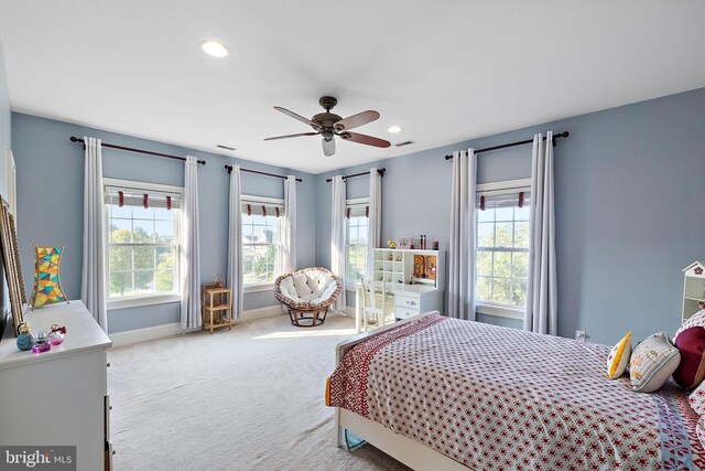 carpeted bedroom with ceiling fan