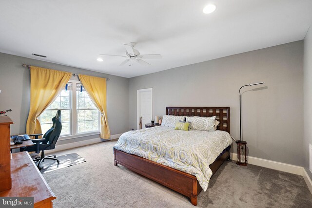 bedroom featuring ceiling fan and carpet floors