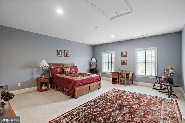 bedroom with light carpet