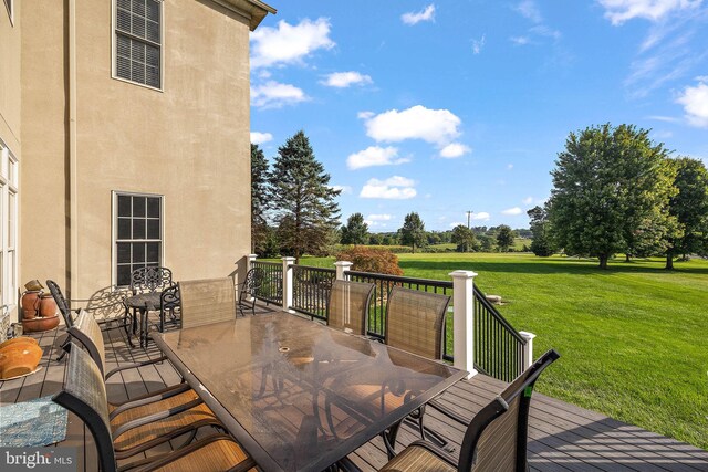 deck featuring a yard