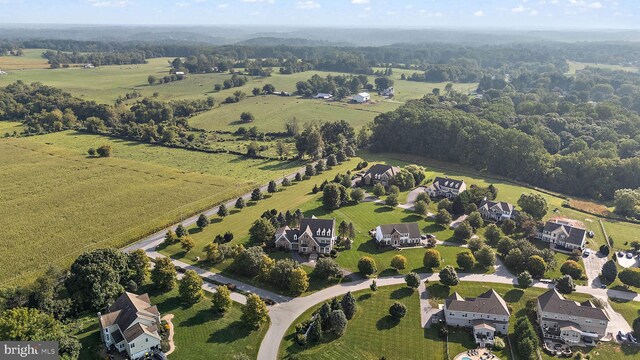 bird's eye view with a rural view