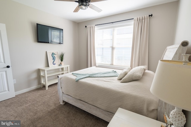 bedroom with ceiling fan and carpet