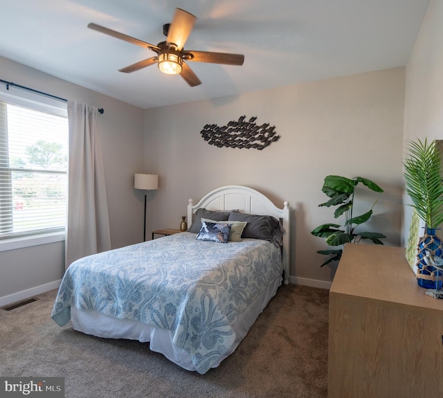 bedroom featuring ceiling fan and carpet flooring