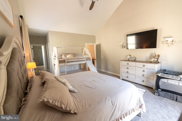 bedroom featuring lofted ceiling, ceiling fan, and carpet