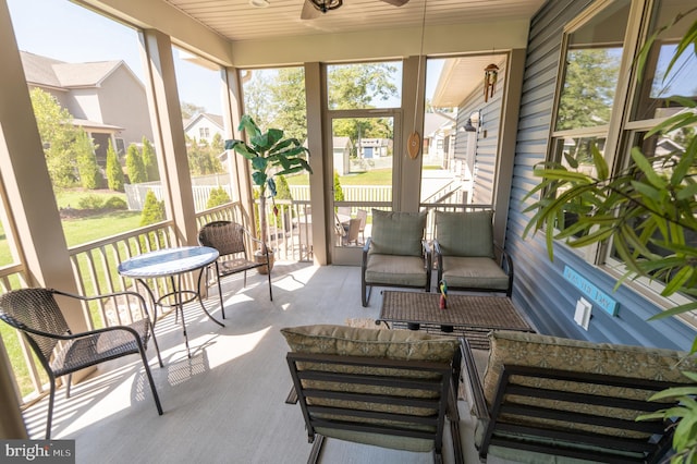 sunroom / solarium with wooden ceiling and a wealth of natural light