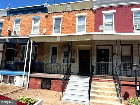 multi unit property featuring covered porch